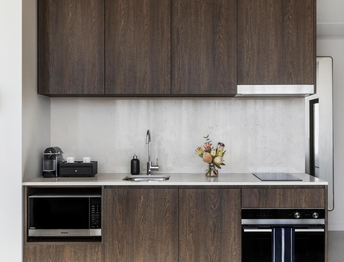 Oakwood Premier Melbourne Aparthotel Exterior photo A kitchen in a typical apartment
